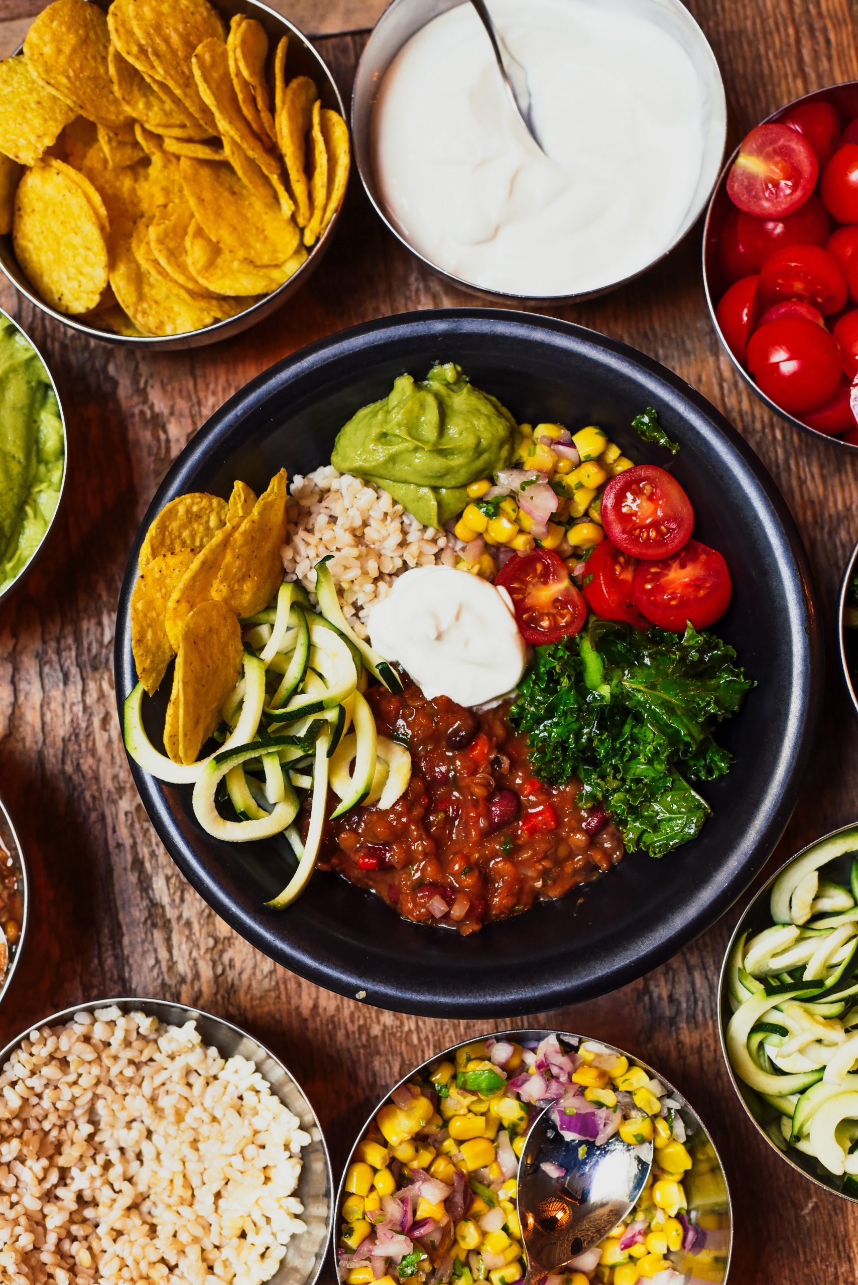 Mexican Buddha Bowl Recipe Idea with corn, rice, beans, tomatoes and other wholefoods